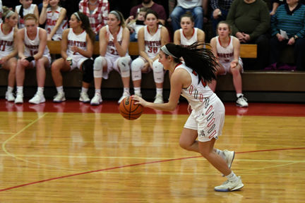Remmert drives down the court